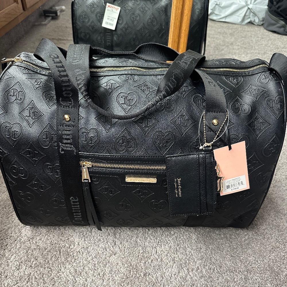BNWT embossed black juicy duffel